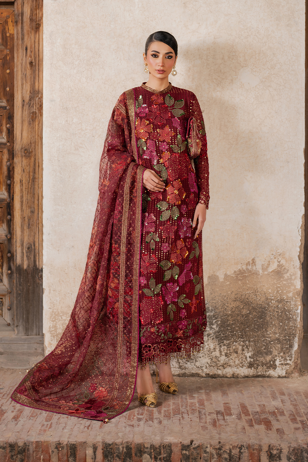 Embroidered maroon luxury chiffon dress with floral and butterfly motifs, gold embellishments, and matching dupatta for women