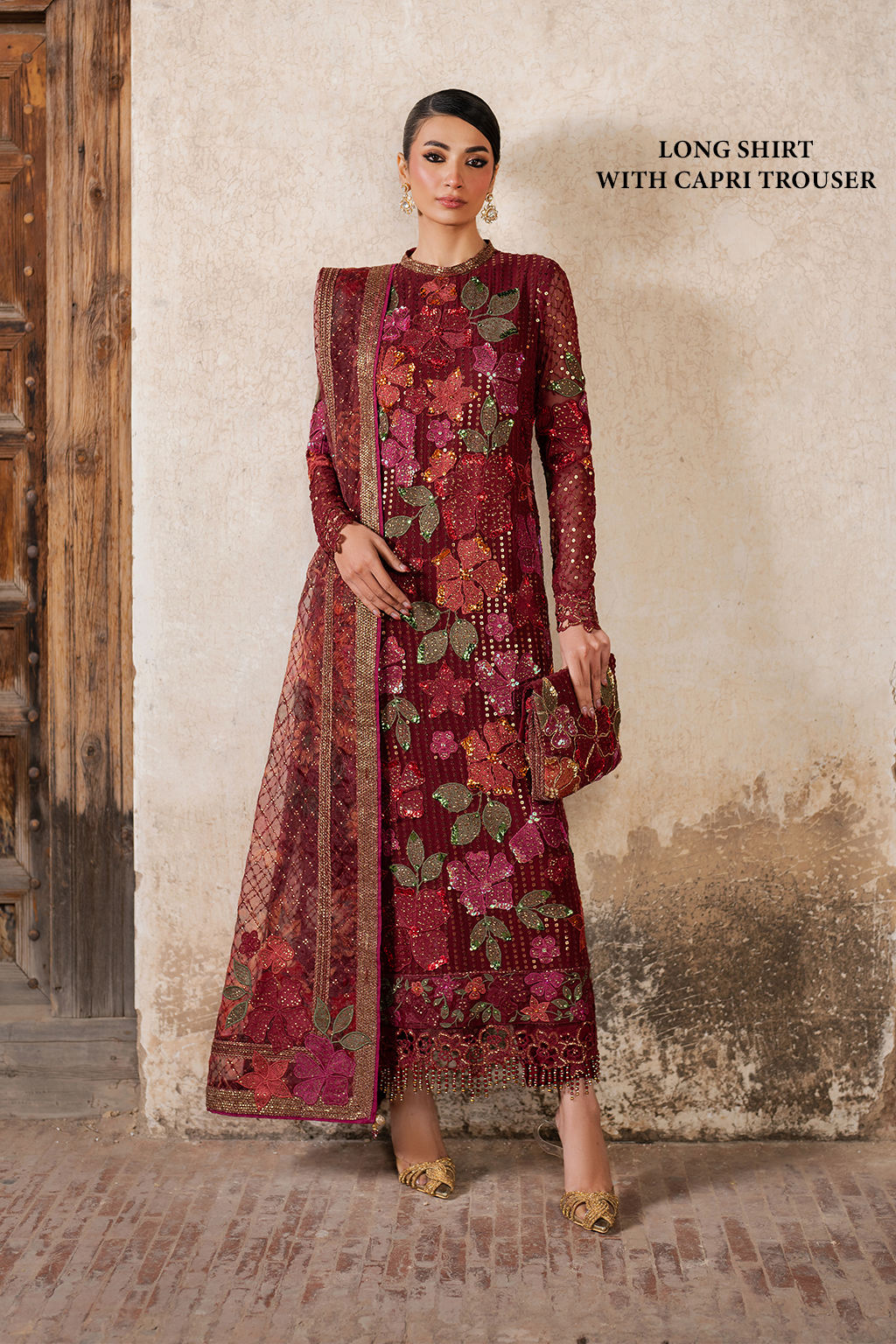 Embroidered maroon chiffon dress with floral and sequin details, traditional Pakistani attire